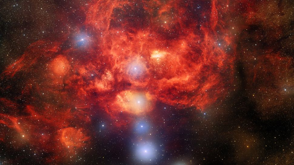 In this amazing new photograph from a dark energy hunter, the “Lobster Nebula” glows crimson.