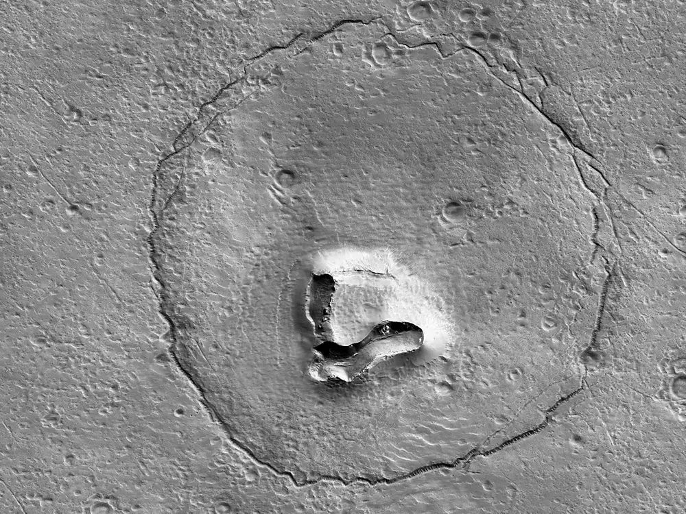 On Mars, a rock structure that resembles a huge bear face was discovered by NASA.