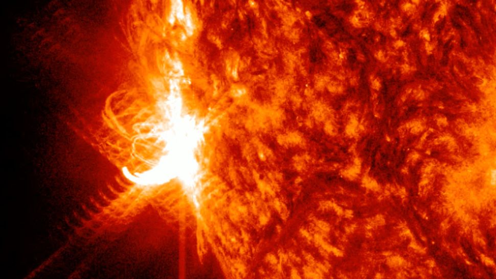 As it rotates to face Earth, a previously undetected sunspot releases a massive X-class solar flare.