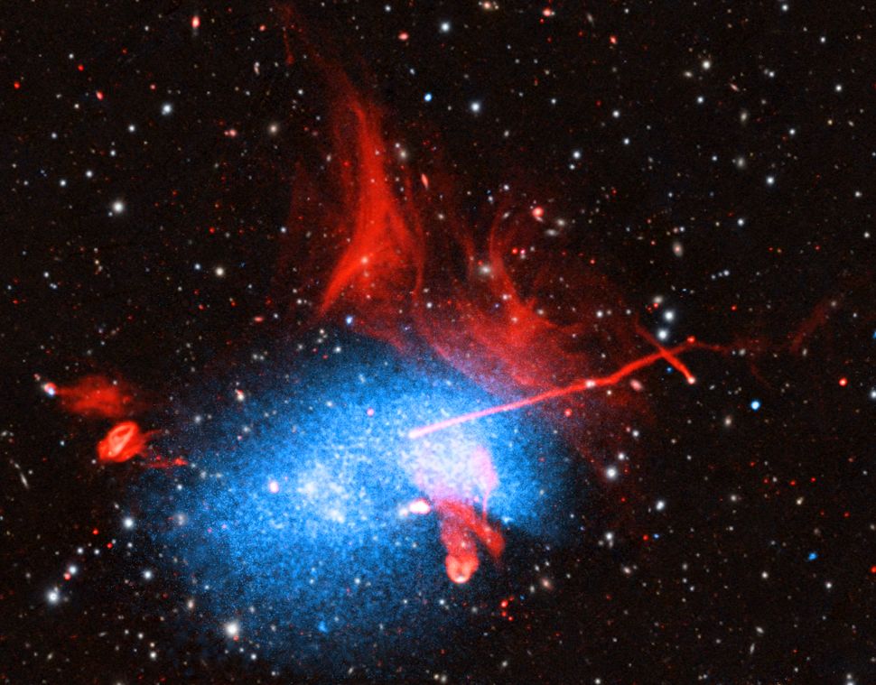 Chaotic ‘knot’ of merging galaxy clusters captured in multiple wavelengths
