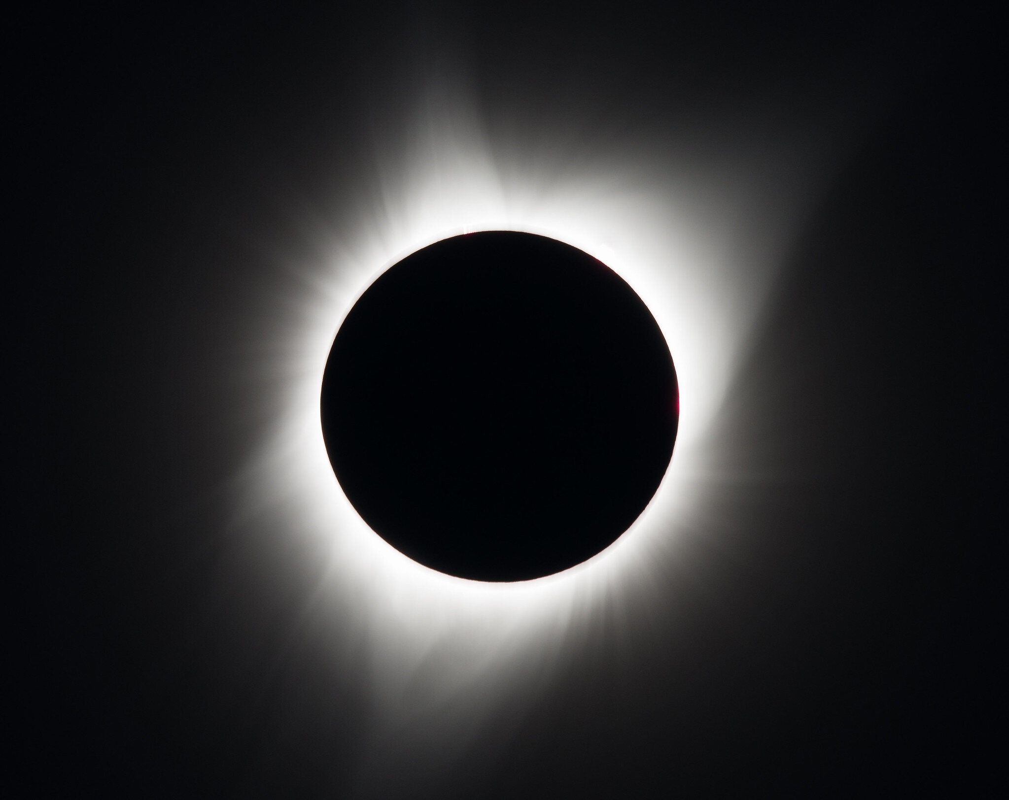 Distinguishing Features Between the 2024 Total Solar Eclipse and Its 2017 Predecessor